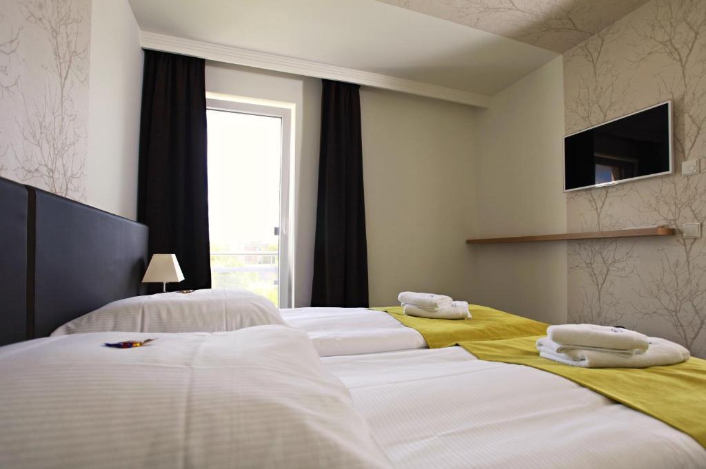 Hotel Warnow Rostock Habitación foto